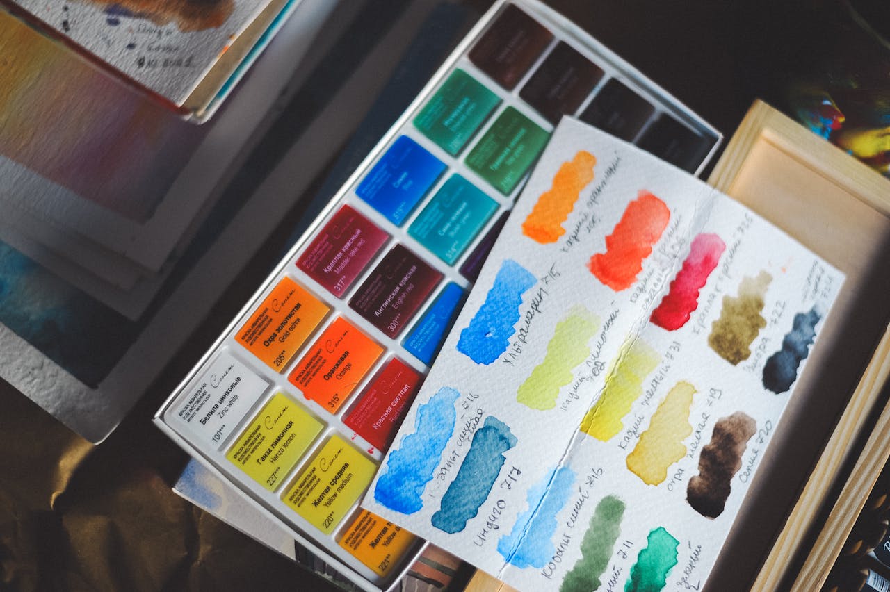 Explore a watercolor palette with vibrant color swatches, perfect for artists and creatives.