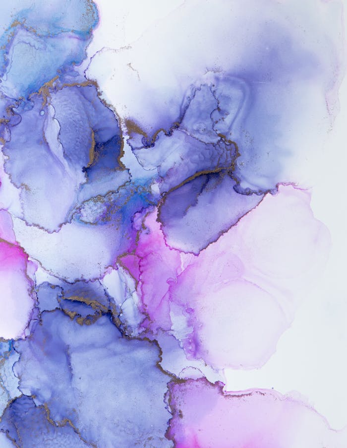 Vibrant abstract watercolor art with purple and pink hues, showcasing a modern artistic texture.